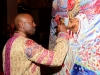 Jimmy Rollins signs a painting during the Rollins Family Foundation Fourth Annual Charity Gala.
