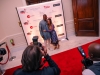Ryan and Krystle Howard pose for a photo on the red carpet.
